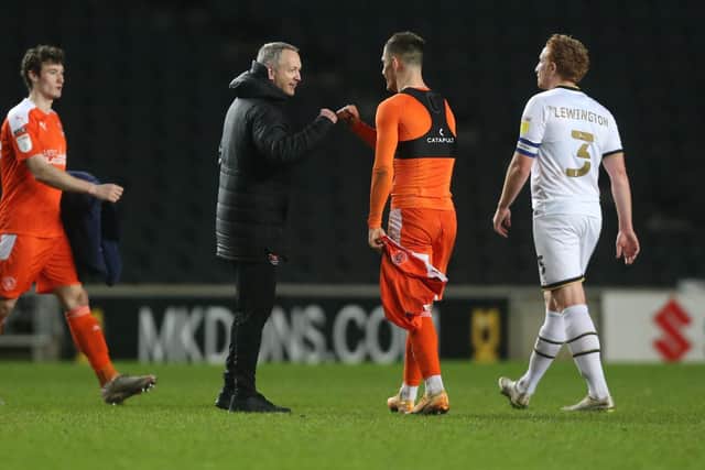 Neil Critchley congratulates Jerry Yates after his midweek winner at MK Dons