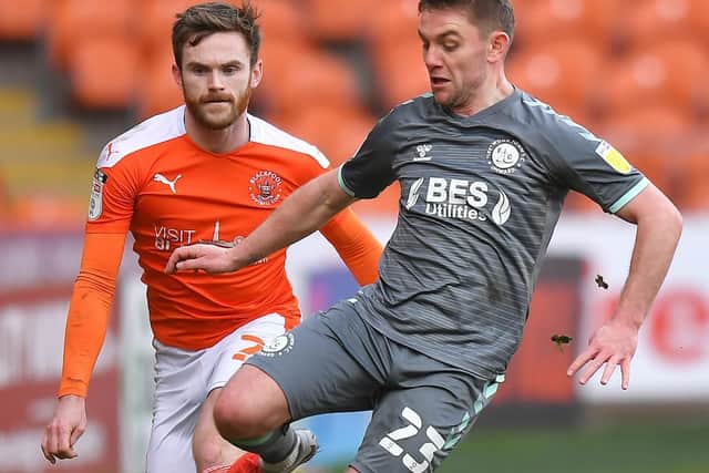Ollie Turton keeps his eyes on the ball during Blackpool's goalless draw against Fleetwood