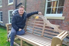 Lytham Hall assistant manager Paul Lomax at the Bobby Ball memorial bench