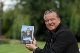 Paul Stewart with his autobiography Damaged in 2019