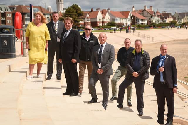 Councillors and members of the management team behind the project as the sea defences were officially unveiled at Fairhaven