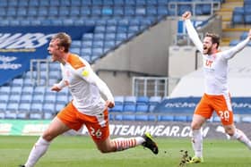 Dan Ballard celebrates scoring Blackpool's second goal of the game