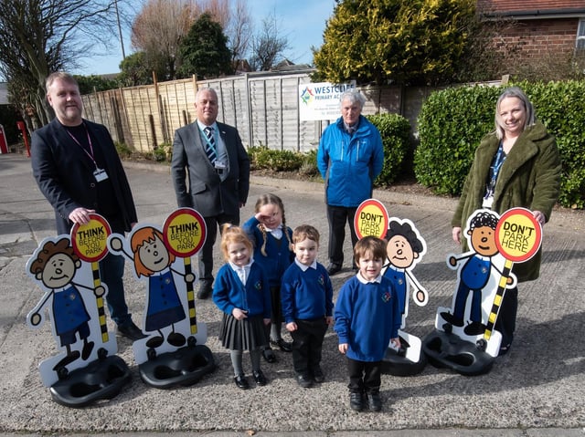 Some of the children with Coun Paul Wilshaw, John Topping from FCAT, Coun Don Clapham and headteacher Amanda Stokes