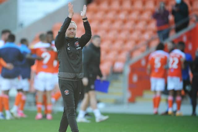 Neil Critchley applauds the fans after September's win over Swindon Town, the only game played in front of spectators at Bloomfield Road this season