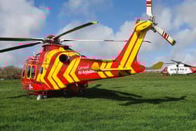 A helicopter at the scene of the crash