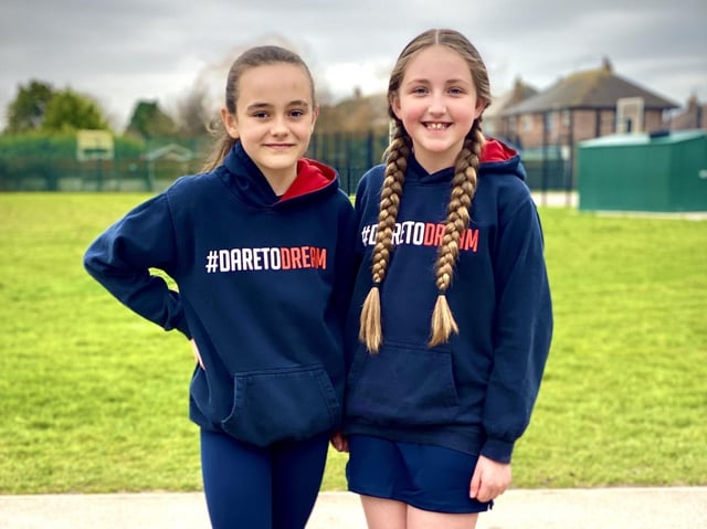 Flakefleet pupils Brooke Parker (left) and Maicey Swales model the new school unform