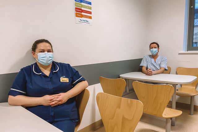 Urology unit staff Rebecca Rogers (left) and Samantha Butcher in the unit's new staff room. Photo: Blue Skies