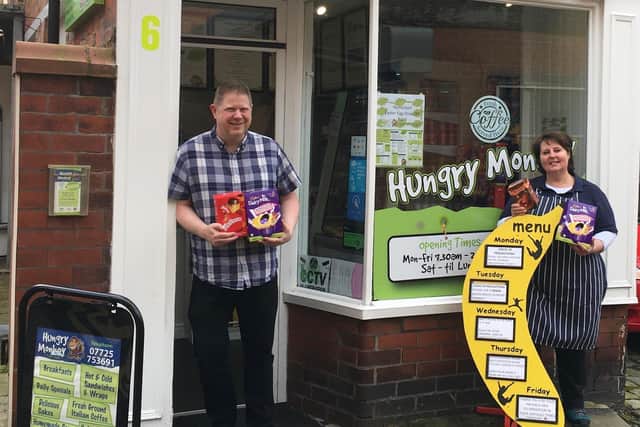 Amanda Hill, from Hungry Monkey sandwich shop on Back St Annes Road West, St Annes, and  Marc Bennett with Easter eggs for Home-Start