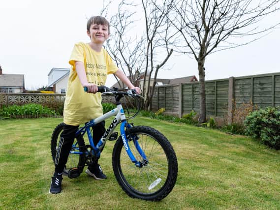 Bobby Casson who is going to cycle 26.2 miles to help raise funds for a play area at larkholme Primary School in memory of his friend, Lucy, who died aged eight last year