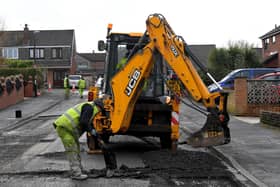 Preparations for surface dressing work to create a smoother, more weather-resistant surface (image: Neil Cross)