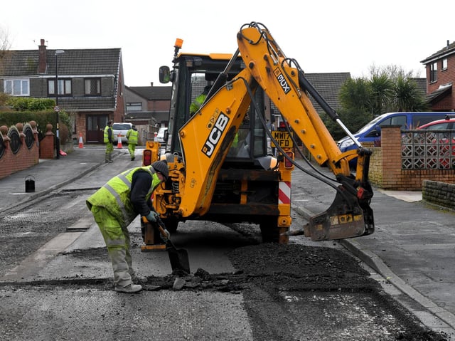 Preparations for surface dressing work to create a smoother, more weather-resistant surface (image: Neil Cross)