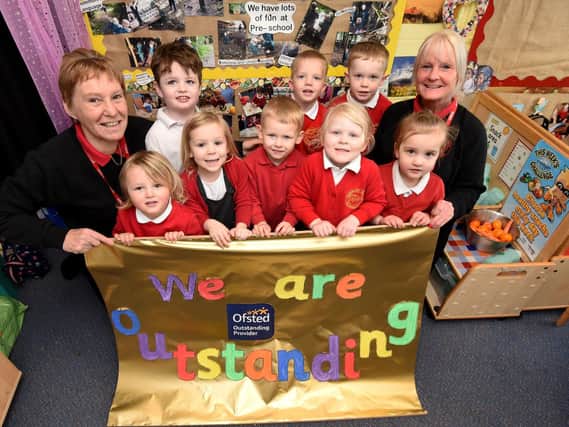 Children from Preesall Fleetwood's Charity Primary pre-school are celebrating their Outstanding rating by Ofsted