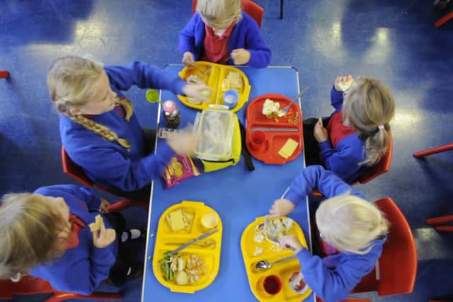 Children at several schools in Blackpool were left without hot school dinners and staff without a month's pay after a catering firm went into administration