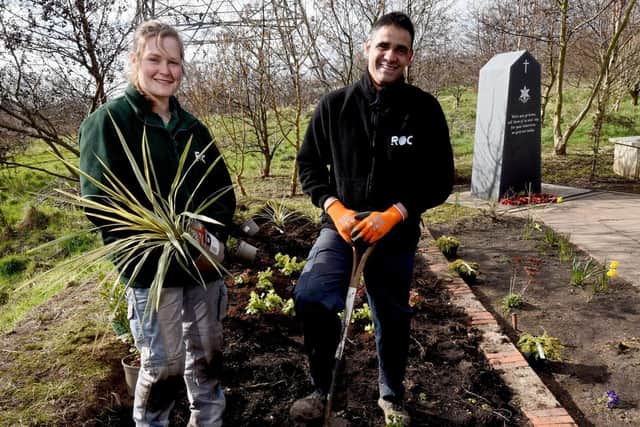 Laura Whiteside and Aron Goff from Reedeming Our Communities help planting at the memorial arboretum in Bispham in preparation for the VE and VJ services later this year.
