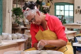 Christine pictured at work on the potter's wheel during the contest  Photo:LOVE Productions.