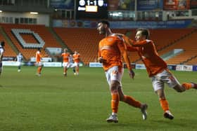 Blackpool celebrate Gary Madine's goal in last season's third-round tie against West Bromwich Albion, which the Seasiders won on penalties