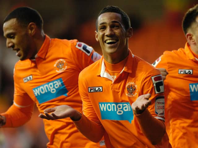 Tom Ince celebrates his deflected goal