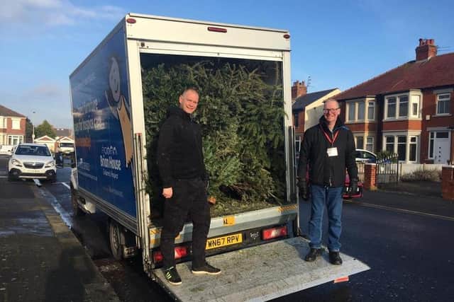 Steve Marsh and Brian Tucker collecting trees for Trinity last year