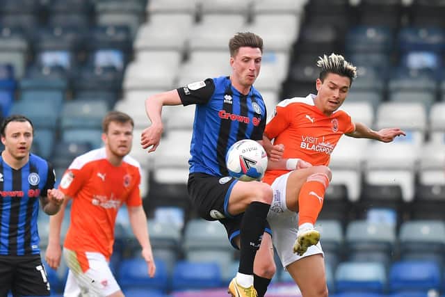 Jake Beesley in action for Rochdale against Blackpool last season