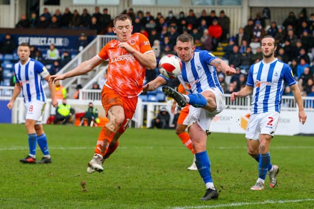 Shayne Lavery battles for the ball at Hartlepool but it wasn't Blackpool's day in front of goal