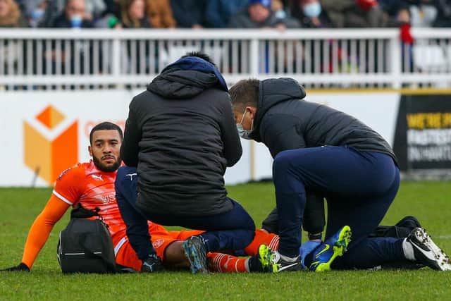 Keshi Anderson receives treatment at Hartlepool but had to leave the field before half-time