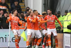 Blackpool celebrate Gary Madine's goal which sealed the 2-0 win over Preston in October
