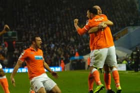 Stephen Dobbie celebrates opening the scoring