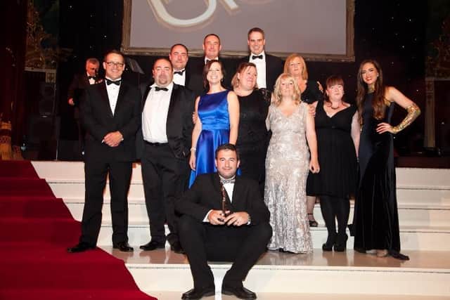 The Connect 2 Cleanrooms team picking up a BIBAs business award in 2013