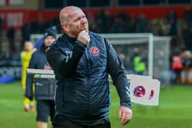 Stephen Crainey celebrates Fleetwood's victory which knocked Rotherham off the top of League One