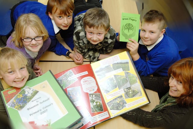 The pupils of Ruswarp Primary School look for sponsorship for their Yorkshire in Bloom garden.