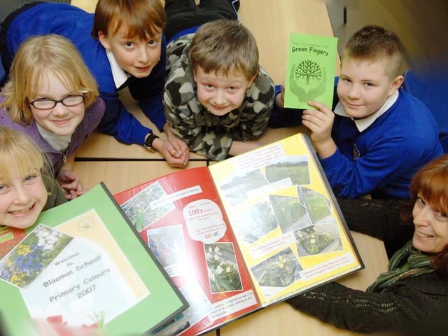 The pupils of Ruswarp Primary School look for sponsorship for their Yorkshire in Bloom garden.