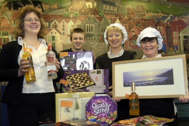 The fundraising team at the Mission and Seafarers Centre show off some of the donated raffle prizes.