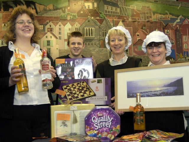 The fundraising team at the Mission and Seafarers Centre show off some of the donated raffle prizes.