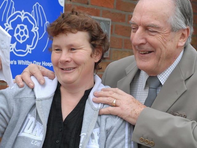 Pictured is St Catherine's Hospice Whitby lottery winner Karen Leeman with chairman Doug MaClennan.