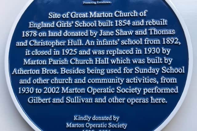The inscription on the blue plaque