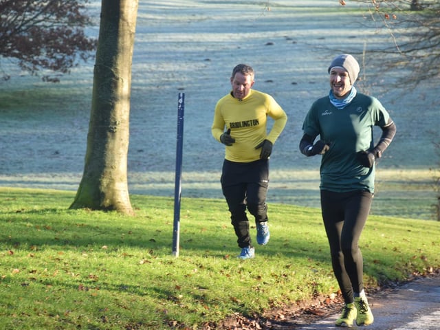 A Bridlington Road Runners hits the grass at a frosty Sewerby Parkrun
Photo by Alexander Fynn