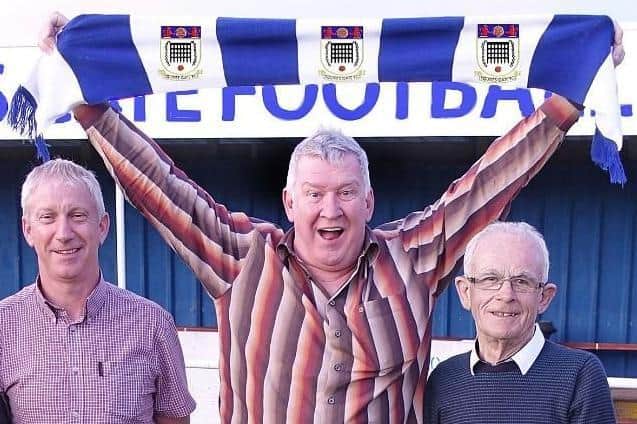 Tony Jo (centre) with Squires Gate stalwarts John Maguire (secretary, left) and Brian Addison (president, after whom their ground is named)