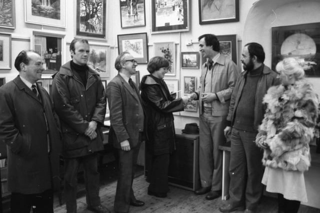 Judges were delighted by the high standard of entries at the sixth annual open exhibition at Garstang and District Arts Centre. Pictured above: Mr Geoffrey Davies, chairman of the Garstang Arts Centre, presents prizes to the exhibition winners