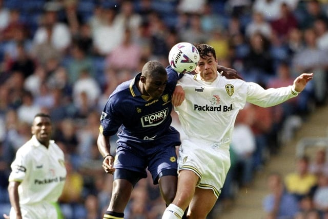 Ian Harte challenges Wimbledon's Carl Leaburn during the Premiership clash at Selhurst Park in August 1998. The game ended 1-1.