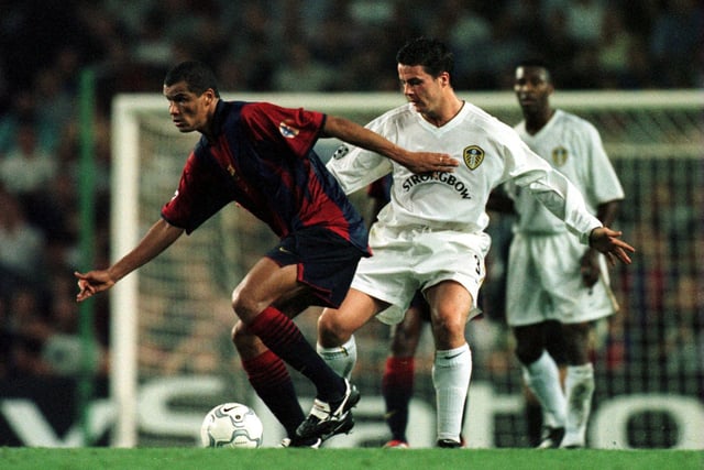 Ian Harte tackles Barcelona's Rivaldo during the Champions League group game at the Nou Camp in September 2000.