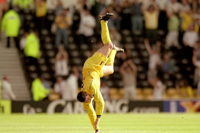 Ian Harte of Leeds United celebrates in his own style during the Premiership clash against Derby County at Pride Park in September 2000. His goal earned Leeds United a point from a 1-1 draw.