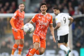 Kenny Dougall helped Blackpool maintain their unbeaten league start to 2022