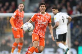 Kenny Dougall helped Blackpool maintain their unbeaten league start to 2022