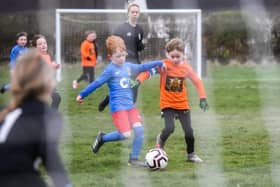 Under-7 action between YMCA Orange and Kirkham Junior Blues
Pictures: DANIEL MARTINO