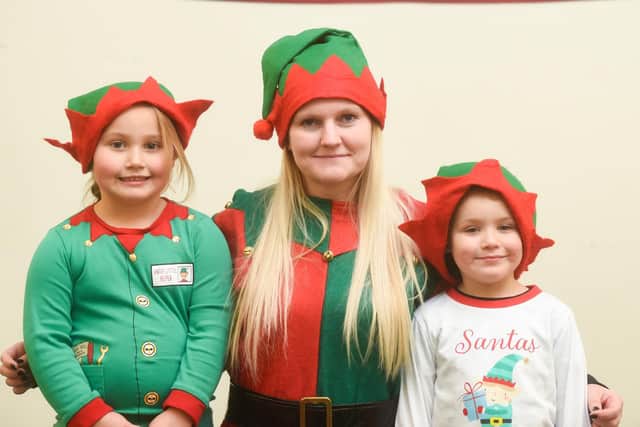 Shelley Hammill with pupils Kaycie and Jacob. It is hoped the elf run can raise as much money as possible for Trinity Hospice.