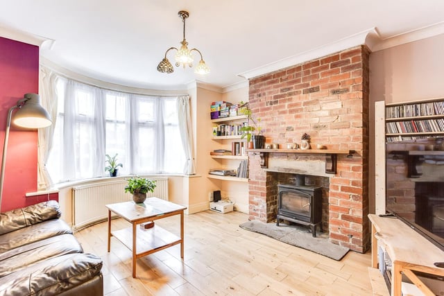 It also has an exposed brick chimney and solid wood flooring.