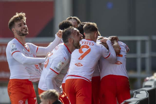 Blackpool celebrate their goal at Bristol City on day one of the season