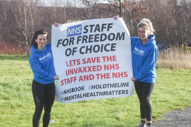 Blackpool NHS workers Emilia Jochymek and Alex Dean make their point during a protest last month