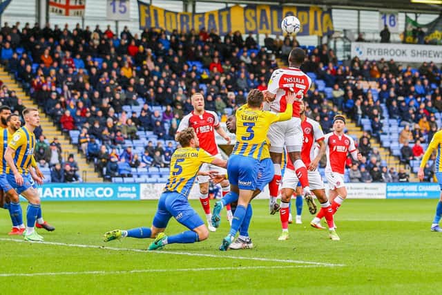 Toto Nsiala in airborne action on his full Fleetwood debut at Shrewsbury
Picture: SAM FIELDING / PRiME MEDIA IMAGES
