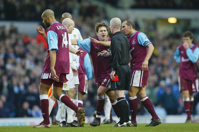 West Ham United striker Frederic Kanoute is sent off while teammates Joe Cole protests to the referee.